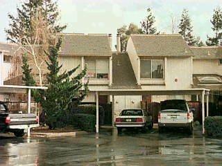 666 Racquet Club Circle Rohnert Park, CA 94928 - Photo 1 of 1 a view of house with swimming pool and a yard