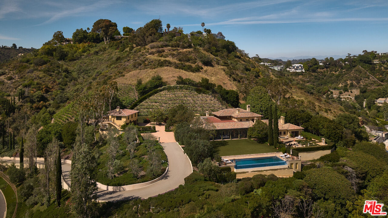 10939 Chalon Road Los Angeles, CA 90077 - Photo 3 of 24 an aerial view of a house with a yard