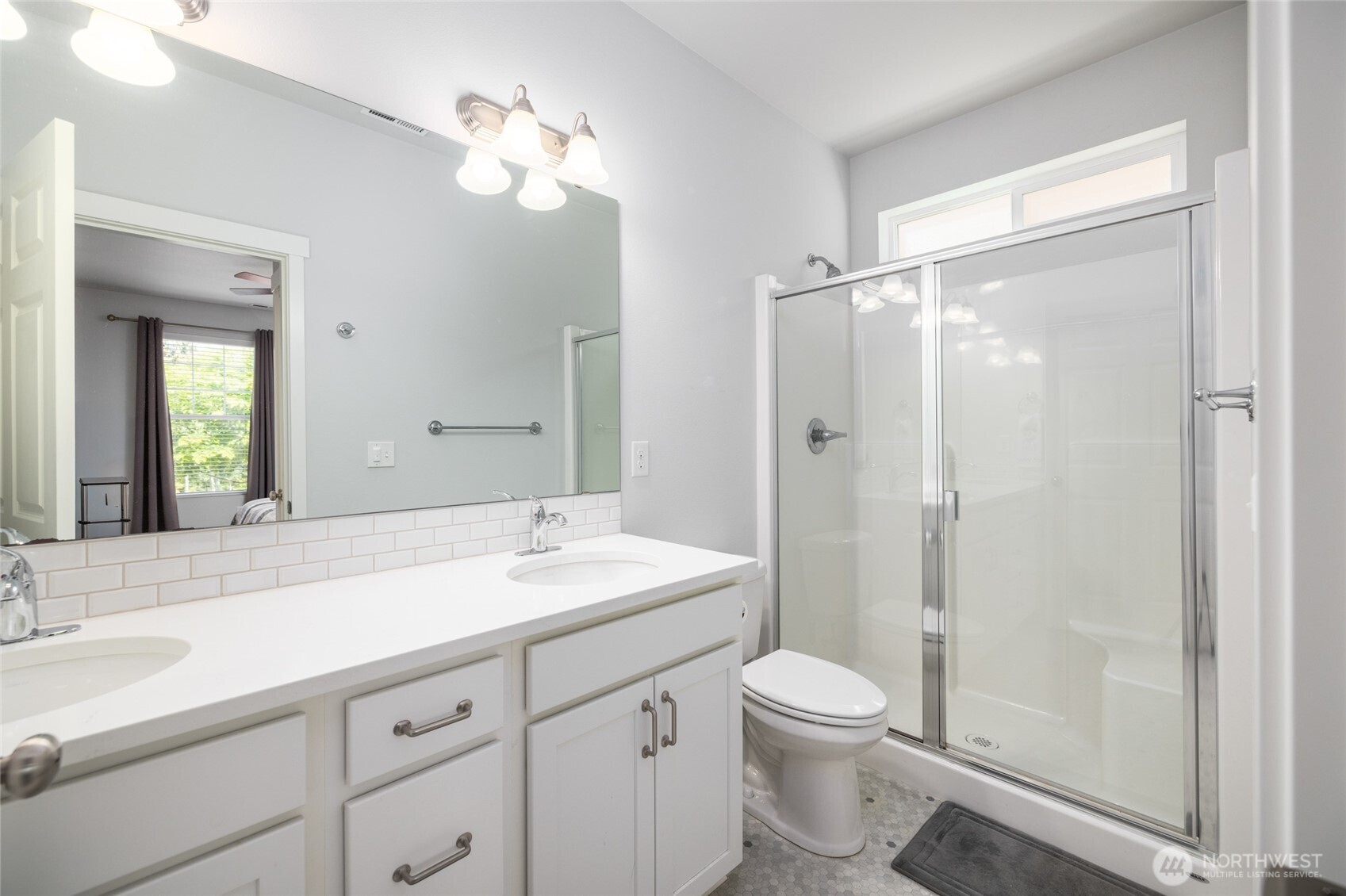 232 Sinclair Alley Mount Vernon, WA 98274 - Photo 15 of 33 a bathroom with a sink a toilet and shower