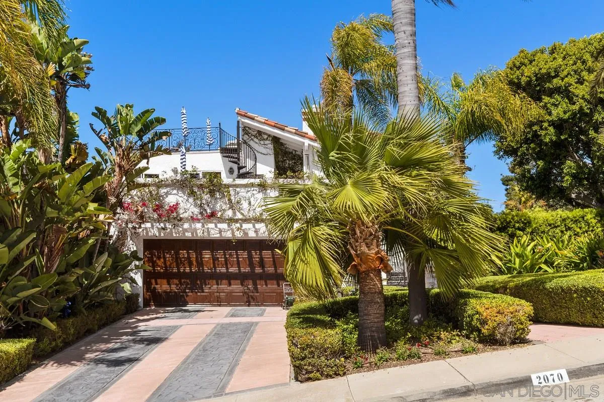 2070 De Mayo Road Del Mar, CA 92014 - Photo 2 of 43 a front view of a house with a yard