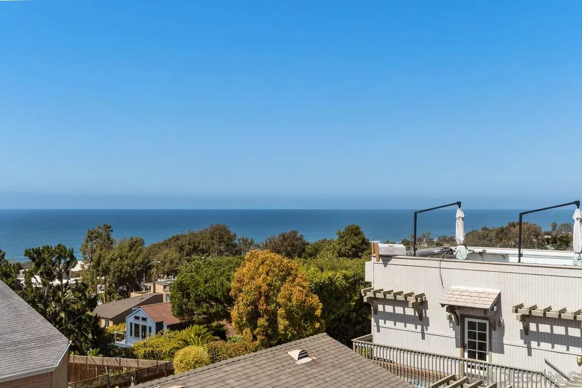 2070 De Mayo Road Del Mar, CA 92014 - Photo 30 of 43 a view of a balcony with chairs and a table