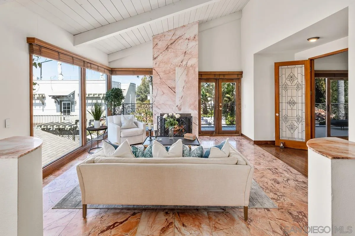 2070 De Mayo Road Del Mar, CA 92014 - Photo 8 of 43 a living room with large window couches and floor to ceiling window