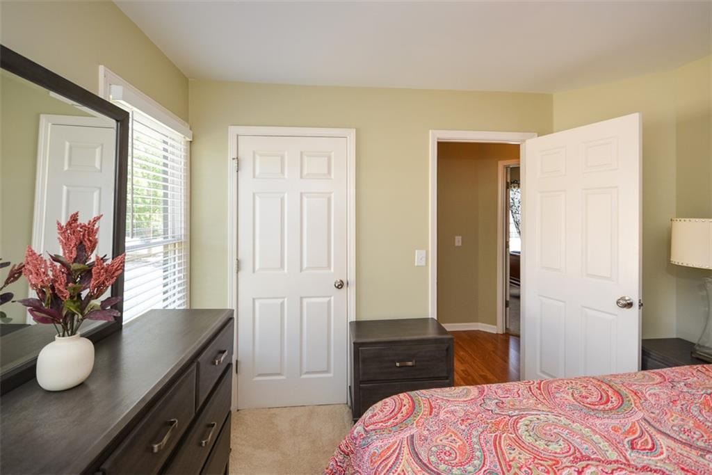 10 Arbor Hills Road South Talking Rock, GA 30175 - Photo 28 of 89 a bedroom with a bed and wooden floor