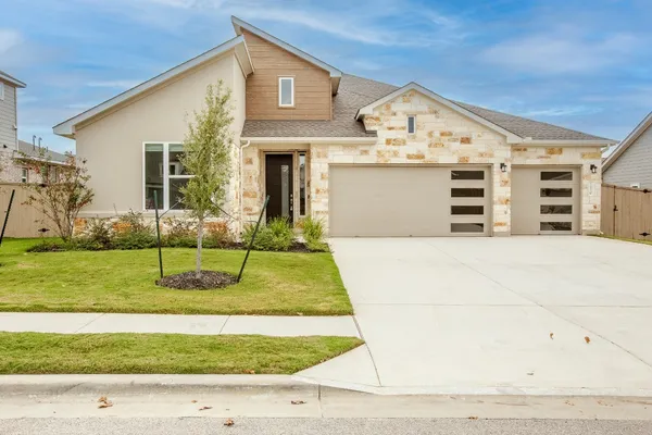 a view of house with outdoor space