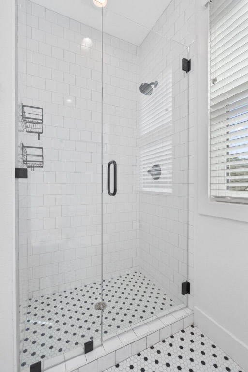4006 Avenue C, Unit D Austin, TX 78751 - Photo 11 of 14 Full bath featuring a shower stall and baseboards