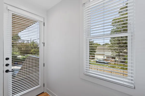 a view of a room that has a window in it