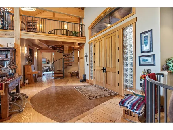 a living room with stainless steel appliances kitchen island granite countertop furniture and a kitchen view
