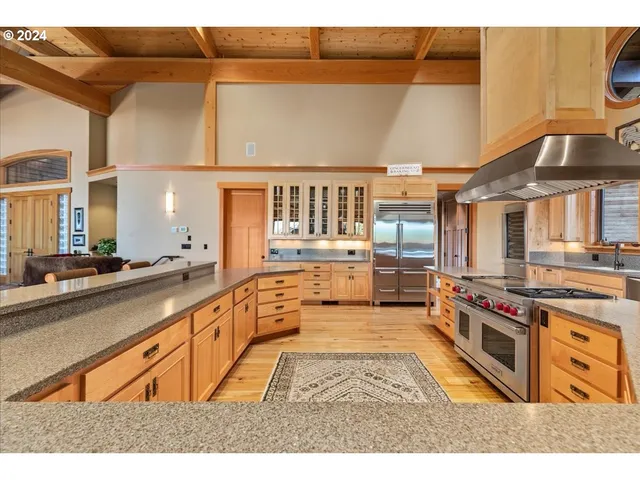 a view of a kitchen with a sink and dishwasher