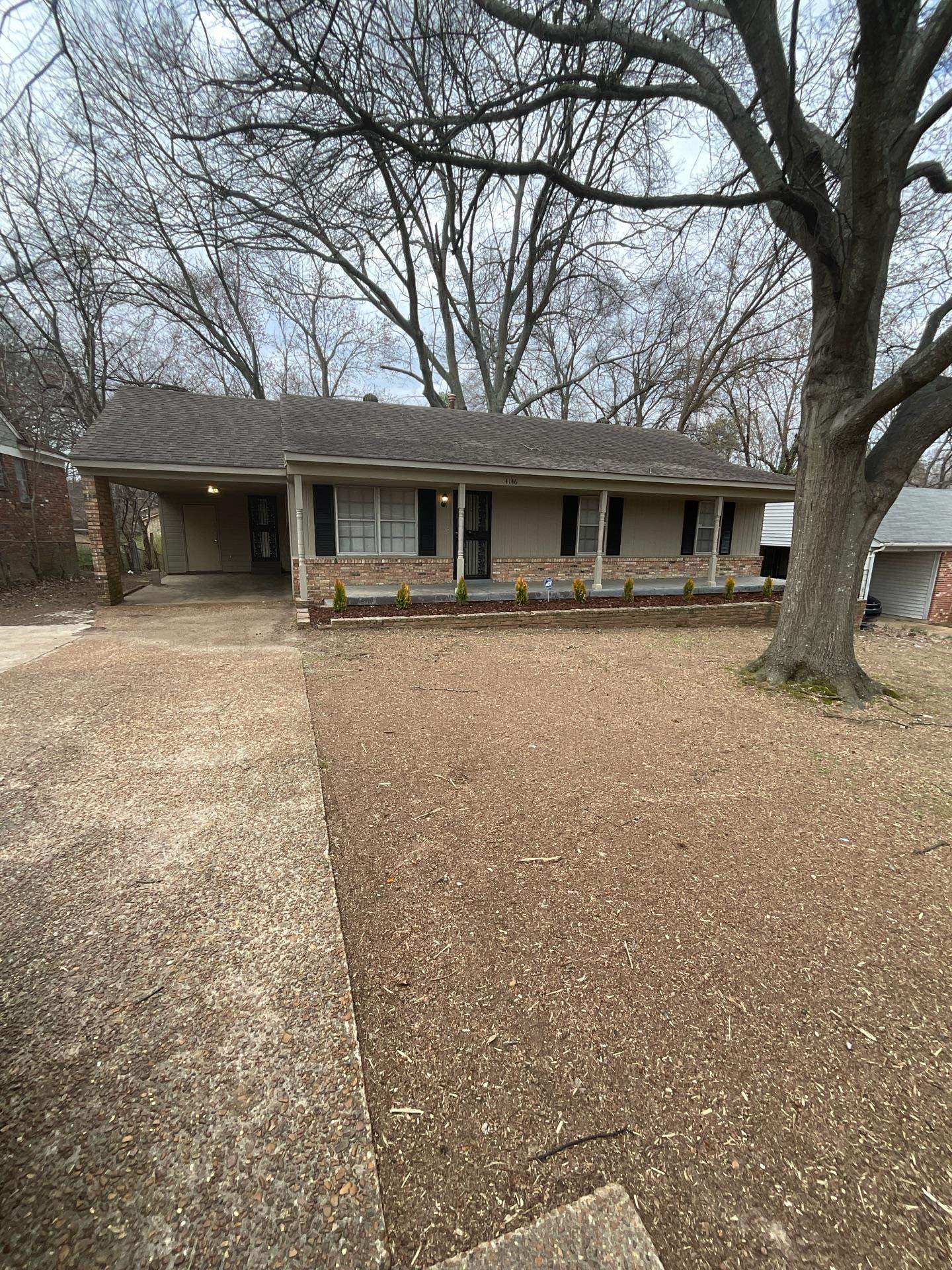 4146 Crain Road Memphis, TN 38128 - Photo 1 of 13 front view of a house with a yard