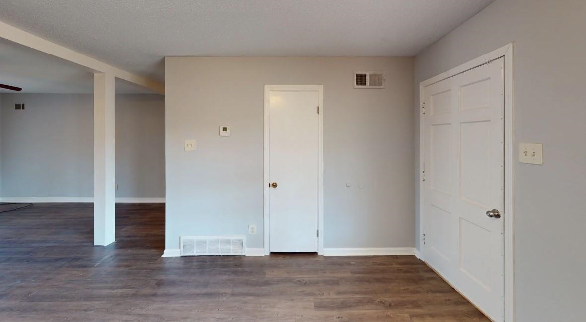 4146 Crain Road Memphis, TN 38128 - Photo 12 of 13 a view of an empty room with wooden floor