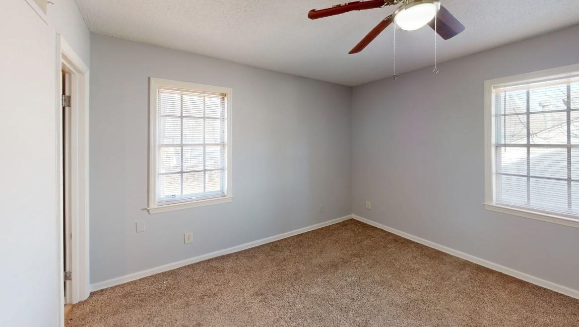 4146 Crain Road Memphis, TN 38128 - Photo 7 of 13 an empty room with windows