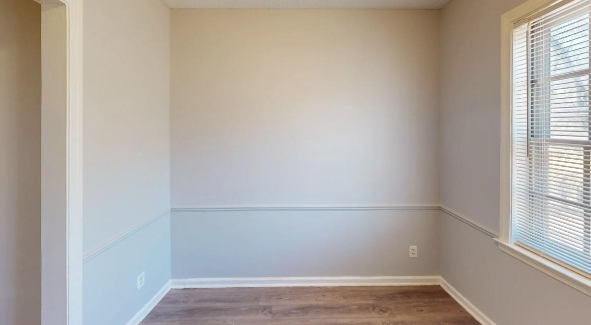 4146 Crain Road Memphis, TN 38128 - Photo 9 of 13 a view of a small space with wooden floor and a window