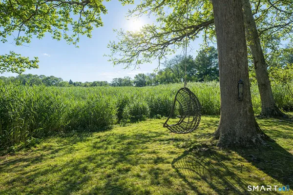 a view of backyard with green space