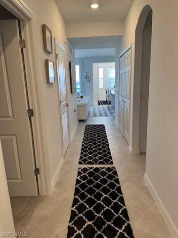 a bathroom with a black white checkered floor and a black white checkered floor