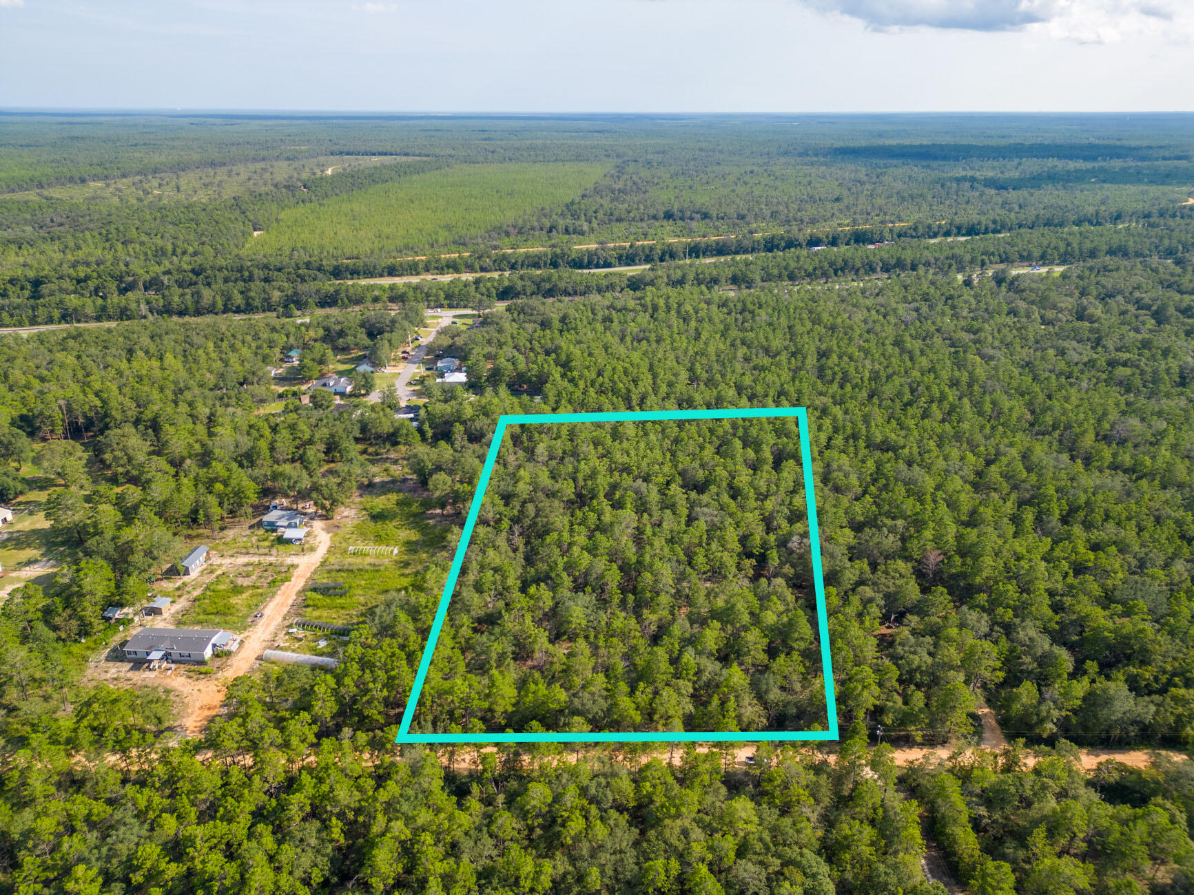 5-acres Carol Lane DeFuniak Springs, FL 32433 - Photo 4 of 10 a view of a yard with a lake view