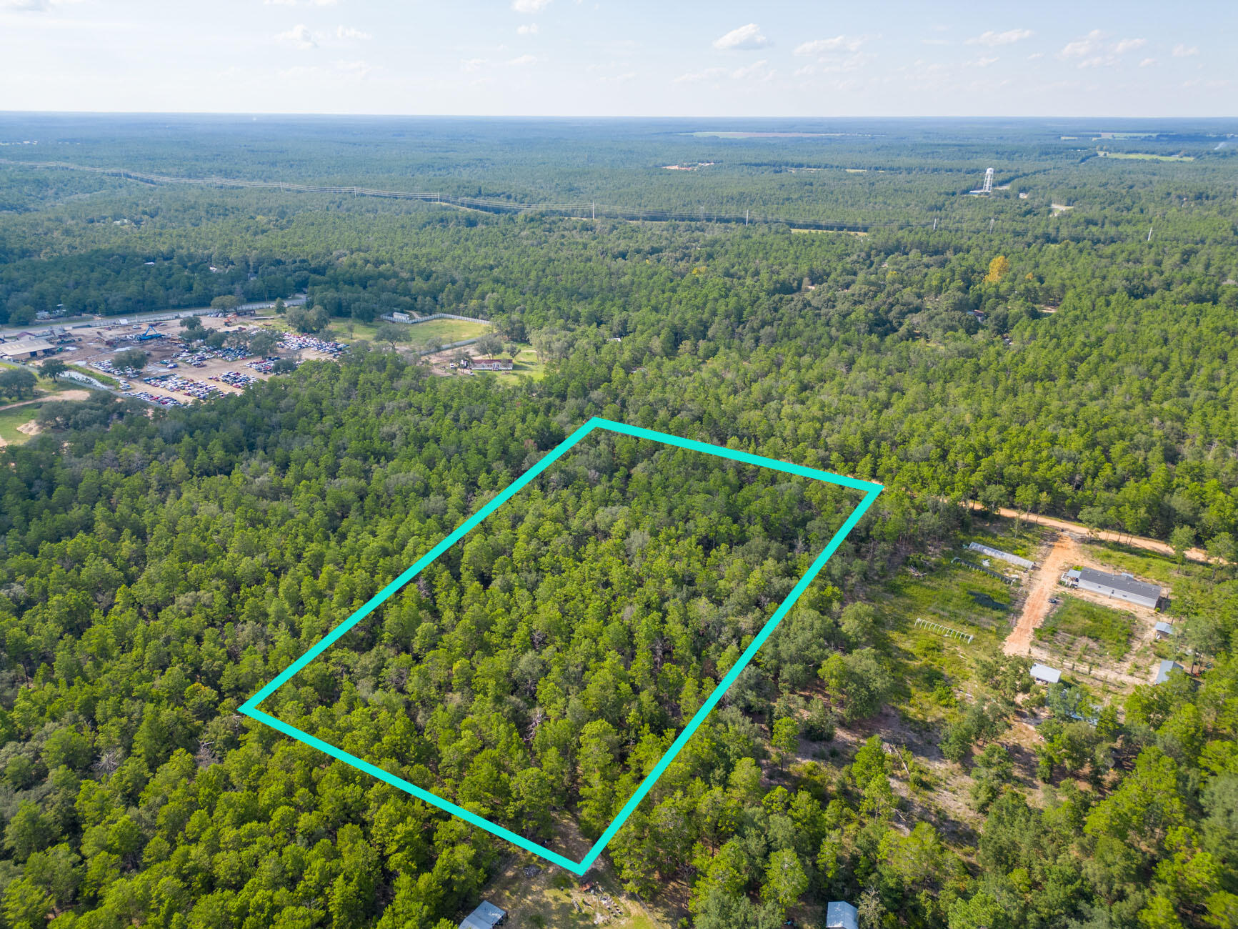 5-acres Carol Lane DeFuniak Springs, FL 32433 - Photo 6 of 10 a view of a tennis court