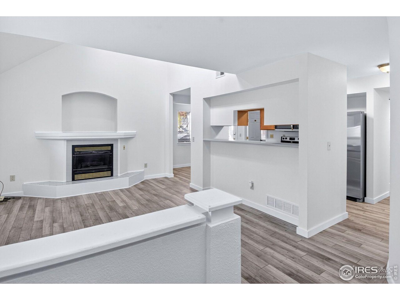2317 Walnut Street Boulder, CO 80302 - Photo 4 of 34 Entryway looking to Living Room and Kitchen w/ New Paint & Flooring