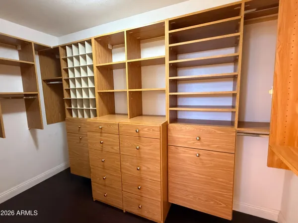 a bathroom with a bathtub and a toilet