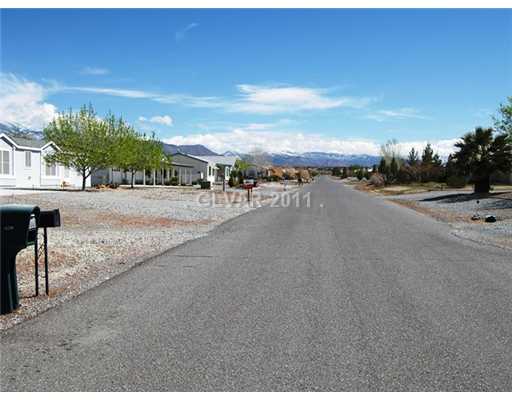5560 Doubletree Road Pahrump, NV 89061 - Photo 25 of 25 Other. Doubltree street scene. Street is chip-sealed. The views are beautiful and the homes show pride of ownership.