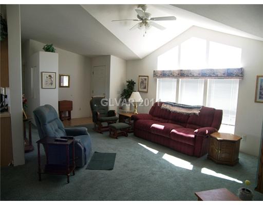 5560 Doubletree Road Pahrump, NV 89061 - Photo 3 of 25 Living Room. Living room has vaulted "origami" ceiling