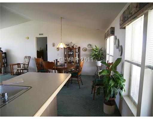 5560 Doubletree Road Pahrump, NV 89061 - Photo 4 of 25 Dining Room. Looking through the kitchen to dining area.