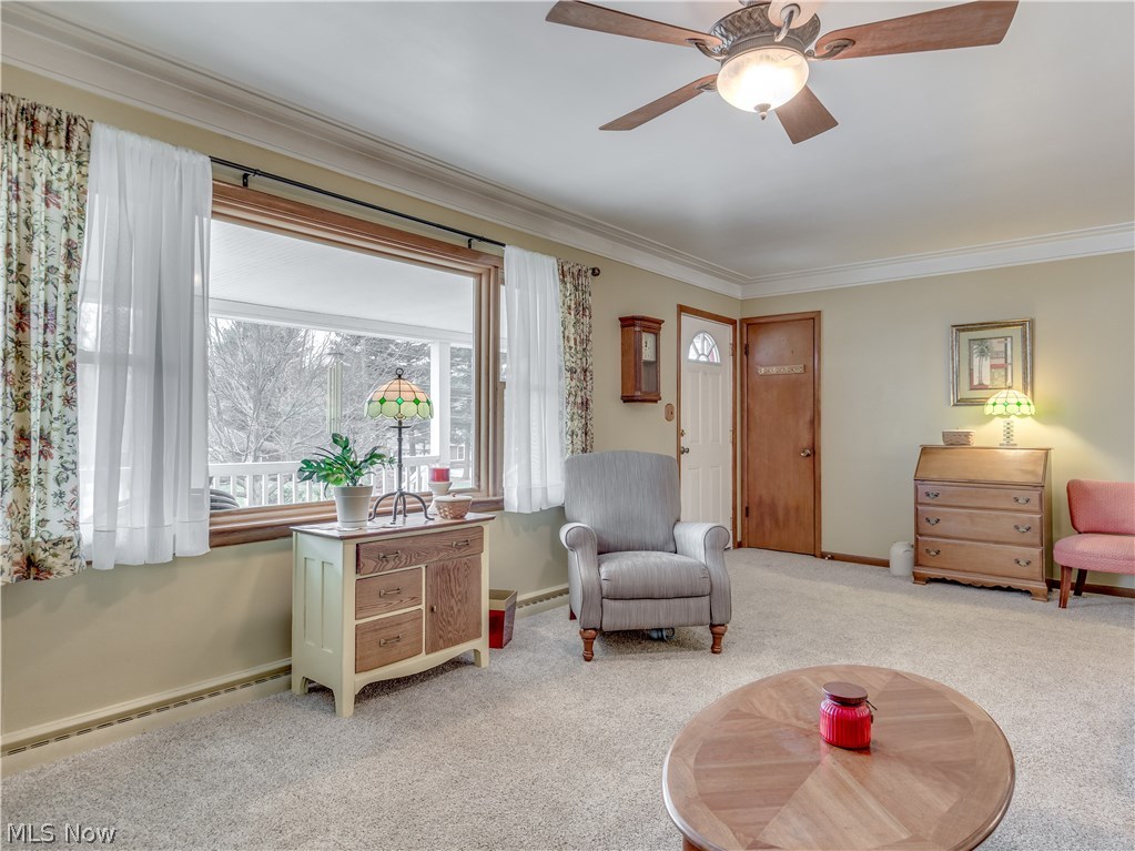 275 Lester Road New Franklin, OH 44319 - Photo 7 of 31 As you enter the home, you are welcomed into the living room that offers a large picture window bringing in tons of natural light, ceiling fan and plush carpet.