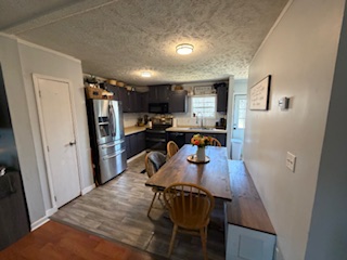 310 Nebo Church Road Seneca, SC 29678 - Photo 5 of 27 This spacious kitchen offers ample room for culinary endeavors and casual dining.