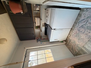 310 Nebo Church Road Seneca, SC 29678 - Photo 8 of 27 This practical laundry room offers convenience and essential amenities for daily living.