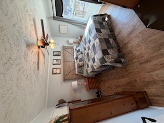 310 Nebo Church Road Seneca, SC 29678 - Photo 9 of 27 This tranquil sleeping space features a ceiling fan and provides a peaceful retreat for residents.