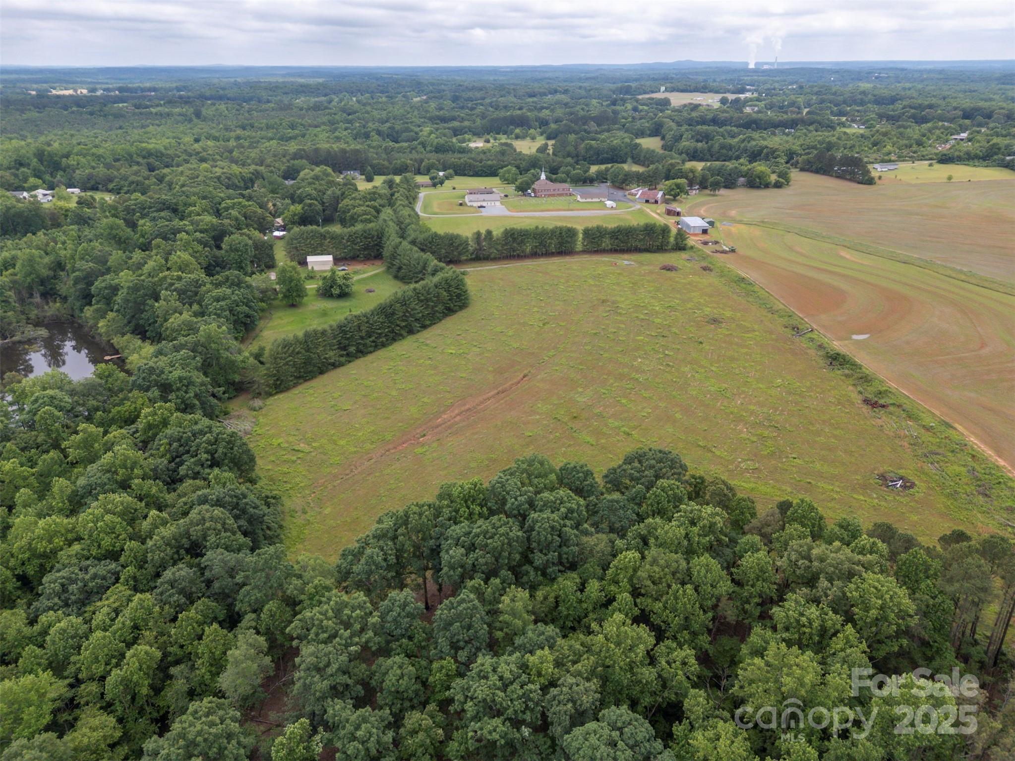 0 Campfield Church Road Ellenboro, NC 28040 - Photo 19 of 32 a view of a lake with a city