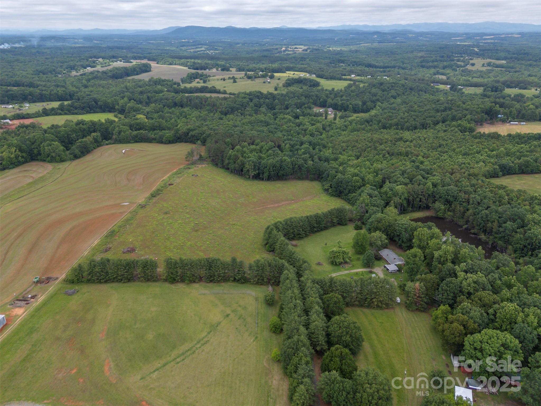 0 Campfield Church Road Ellenboro, NC 28040 - Photo 7 of 32 an aerial view of a house with a yard