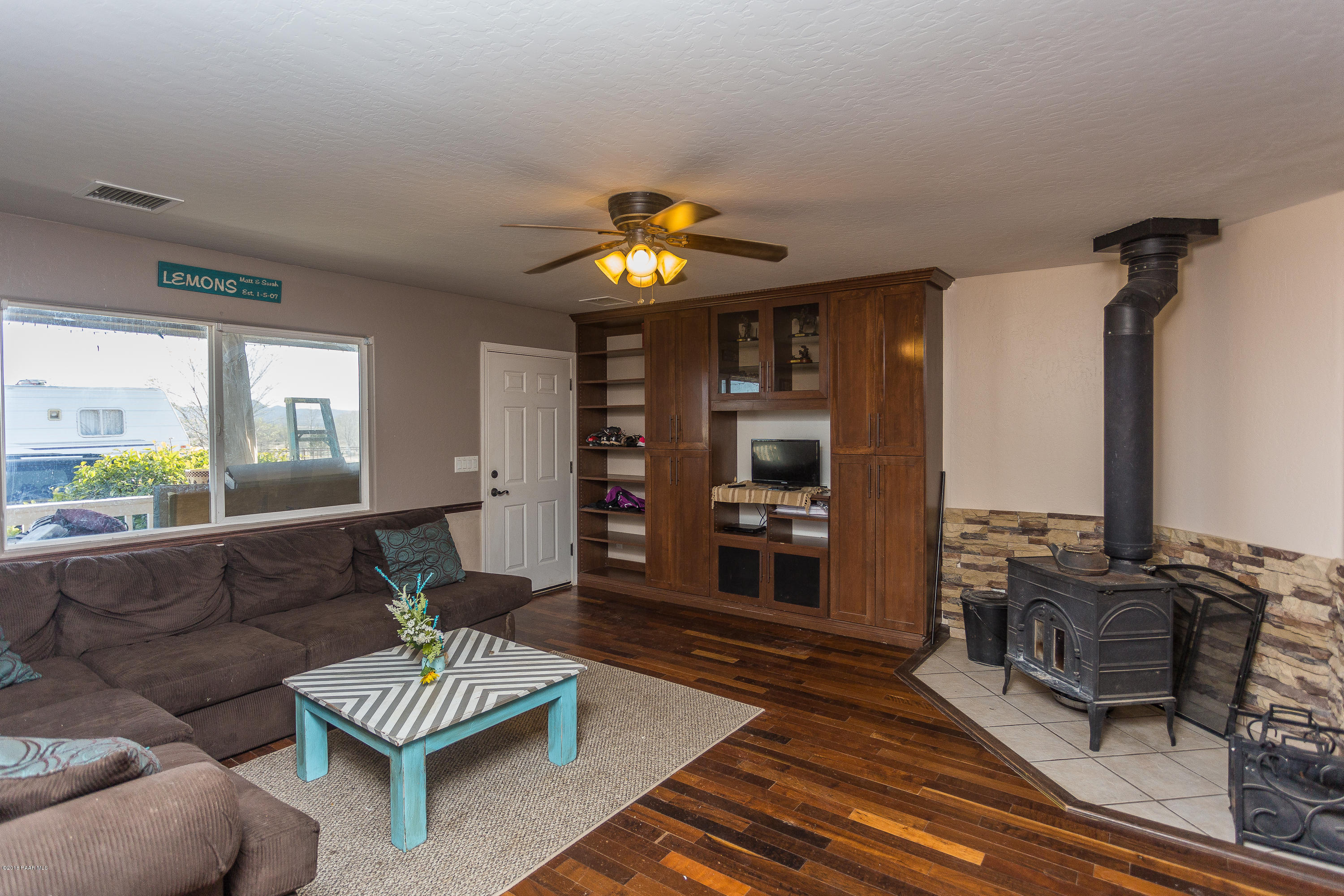25805 Poppy Road Paulden, AZ 86334 - Photo 3 of 17 a living room with furniture and a flat screen tv