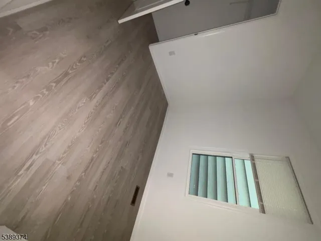 a view of staircase with rug floor