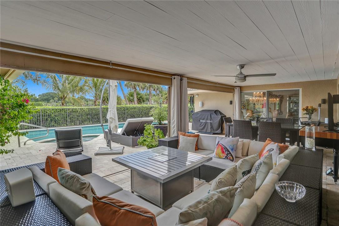 5854 Pinebrook Drive Boca Raton, FL 33433 - Photo 41 of 55 COVERED PATIO WITH POOL AND GOLF VIEW