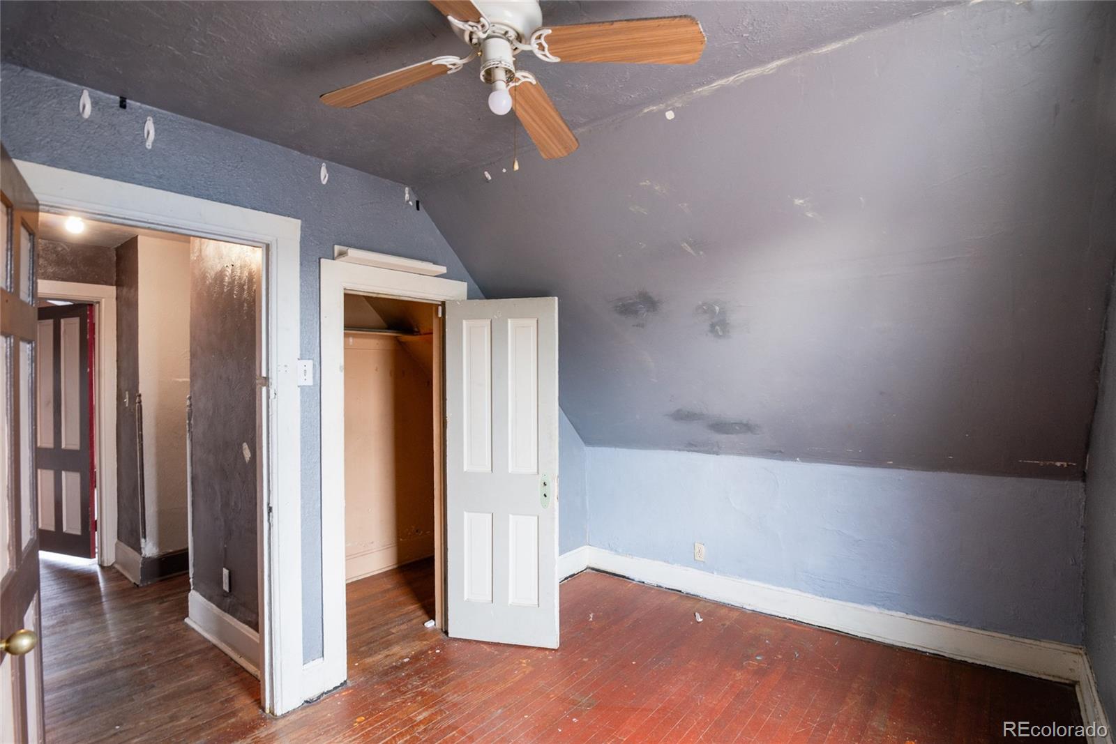 662 South Logan Street Denver, CO 80209 - Photo 14 of 25 wooden floor in an empty room with a window
