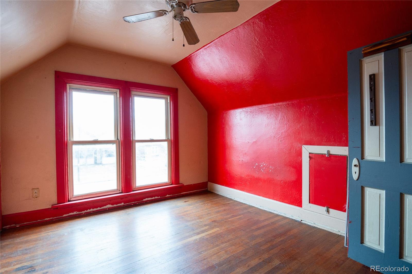 662 South Logan Street Denver, CO 80209 - Photo 16 of 25 a view of empty room with wooden floor and fan