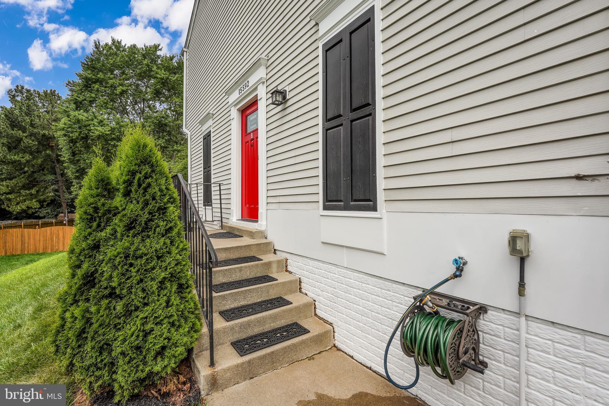 15592 Northgate Drive Dumfries, VA 22025 - Photo 2 of 51 a view of a balcony with chairs and potted plants