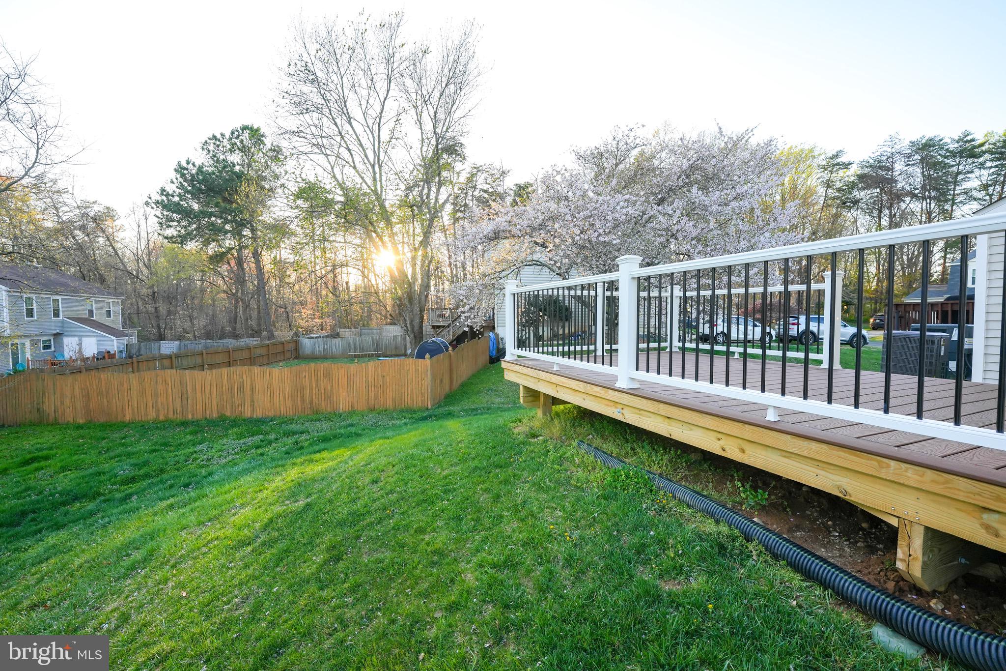 15592 Northgate Drive Dumfries, VA 22025 - Photo 22 of 51 a view of a backyard with wooden fence
