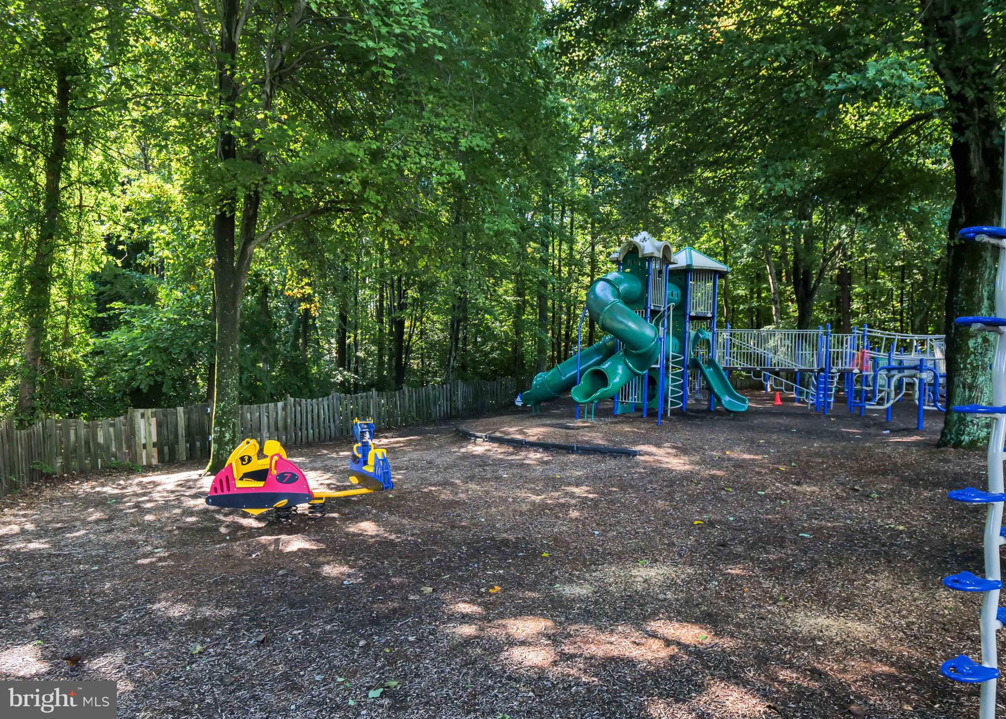 15592 Northgate Drive Dumfries, VA 22025 - Photo 36 of 51 a childrens park with lots of swings and slides