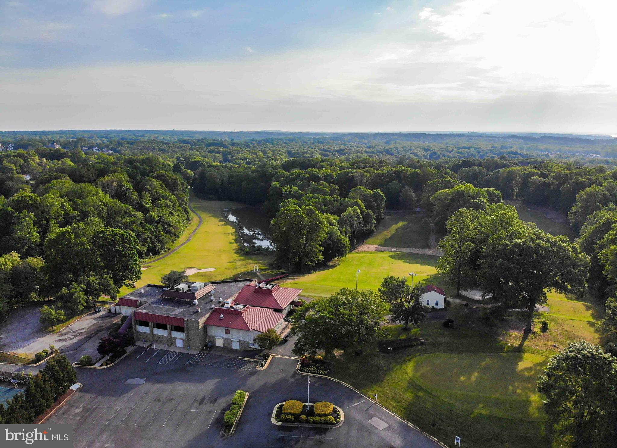 15592 Northgate Drive Dumfries, VA 22025 - Photo 41 of 51 an aerial view of a swimming pool patio and lake view