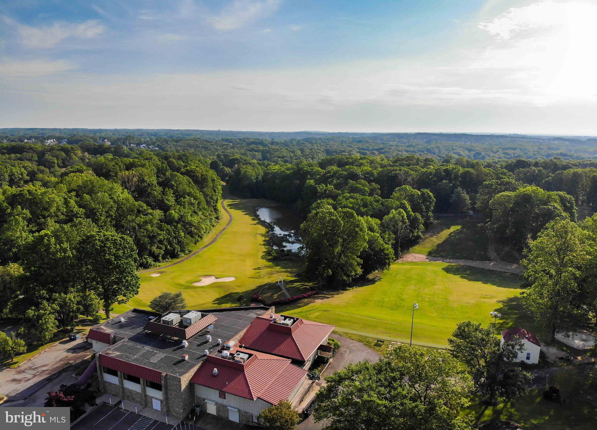 15592 Northgate Drive Dumfries, VA 22025 - Photo 42 of 51 an aerial view of residential houses with outdoor space and swimming pool
