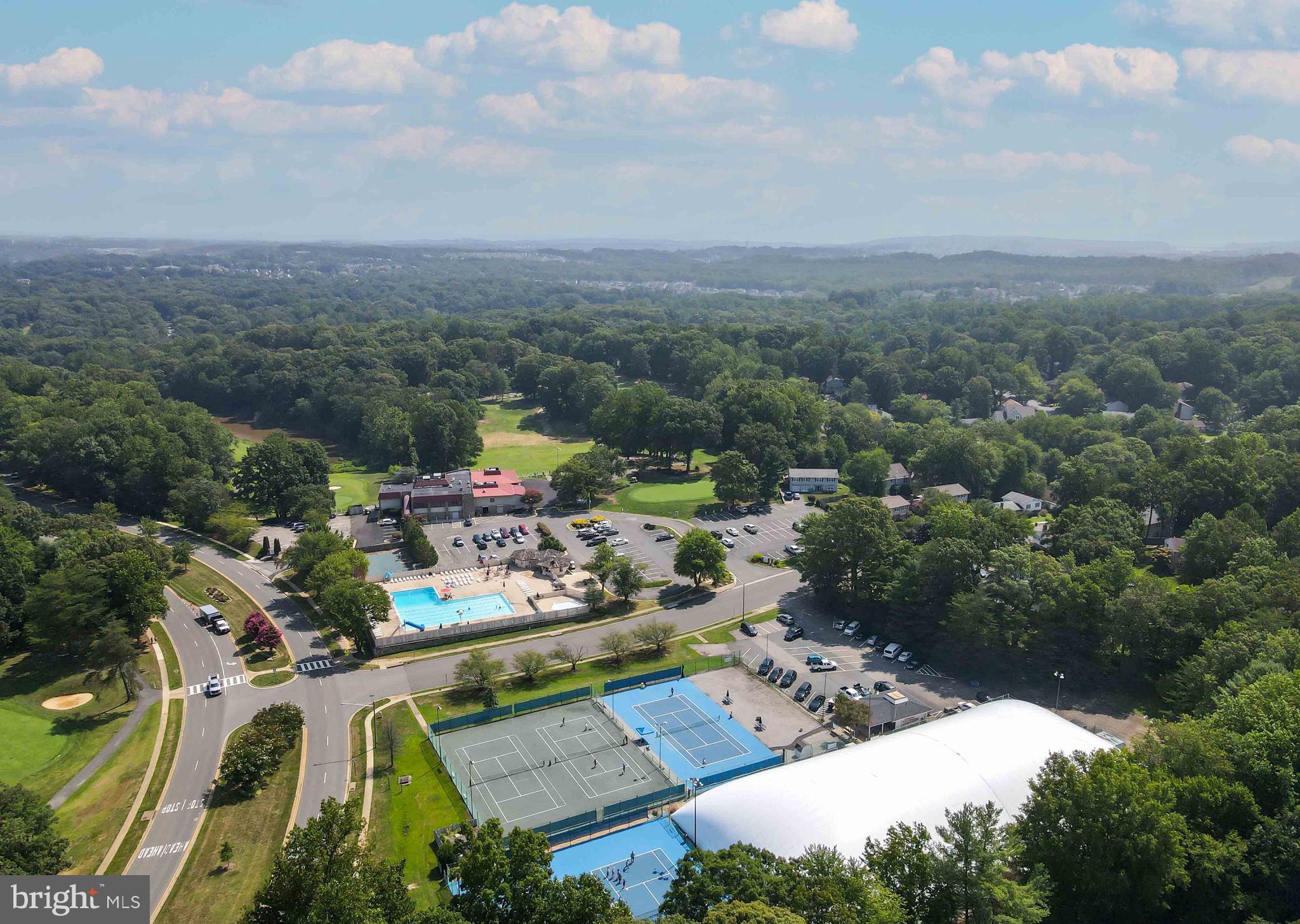 15592 Northgate Drive Dumfries, VA 22025 - Photo 45 of 51 an aerial view of residential houses with outdoor space and trees