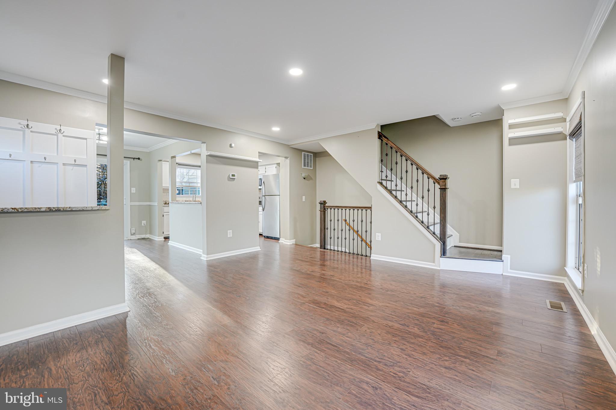 15592 Northgate Drive Dumfries, VA 22025 - Photo 10 of 51 a view of an empty room with wooden floor
