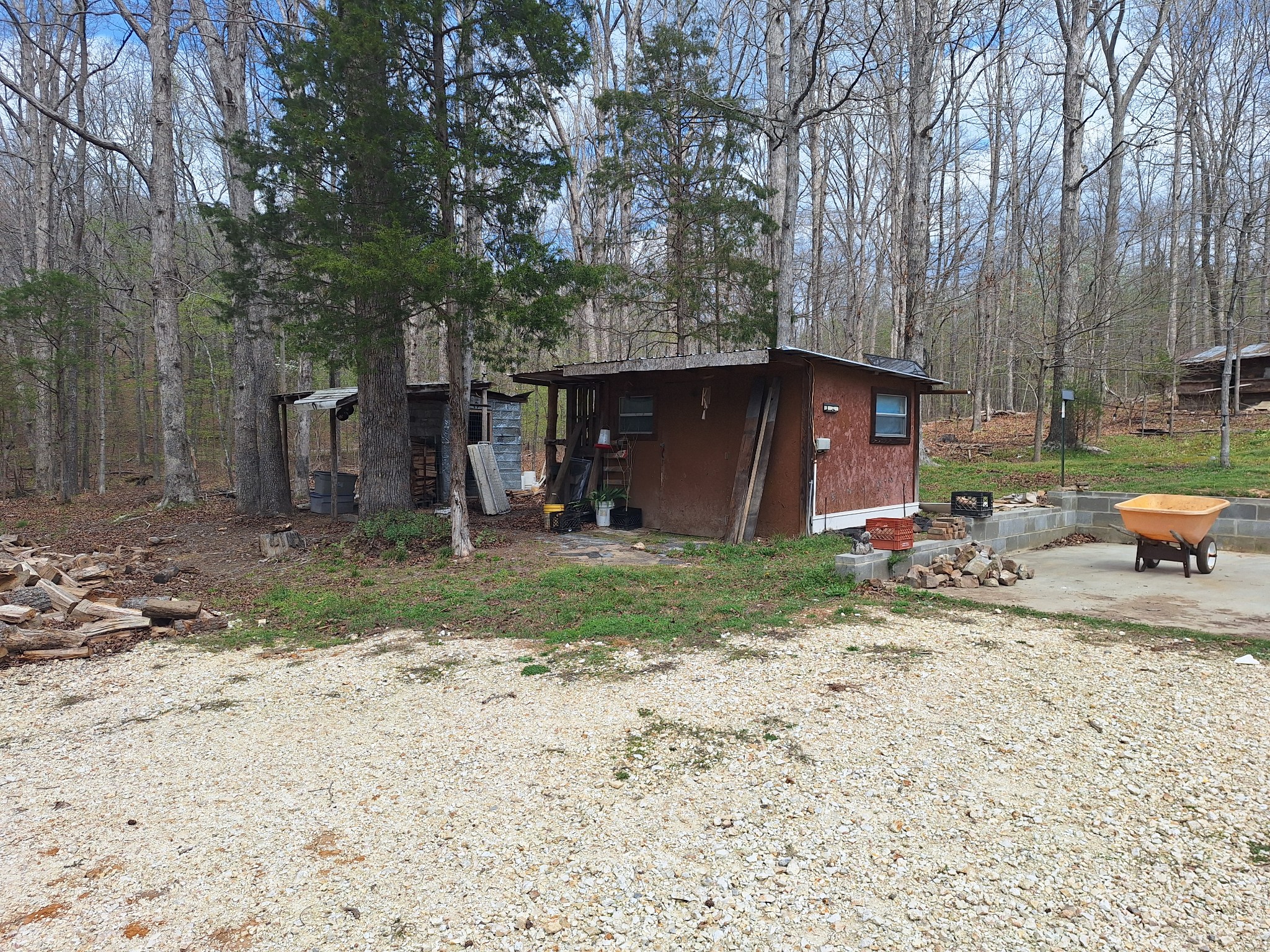 1622 Hill Chapel Road Big Sandy, TN 38221 - Photo 12 of 14 a front view of a house with garden