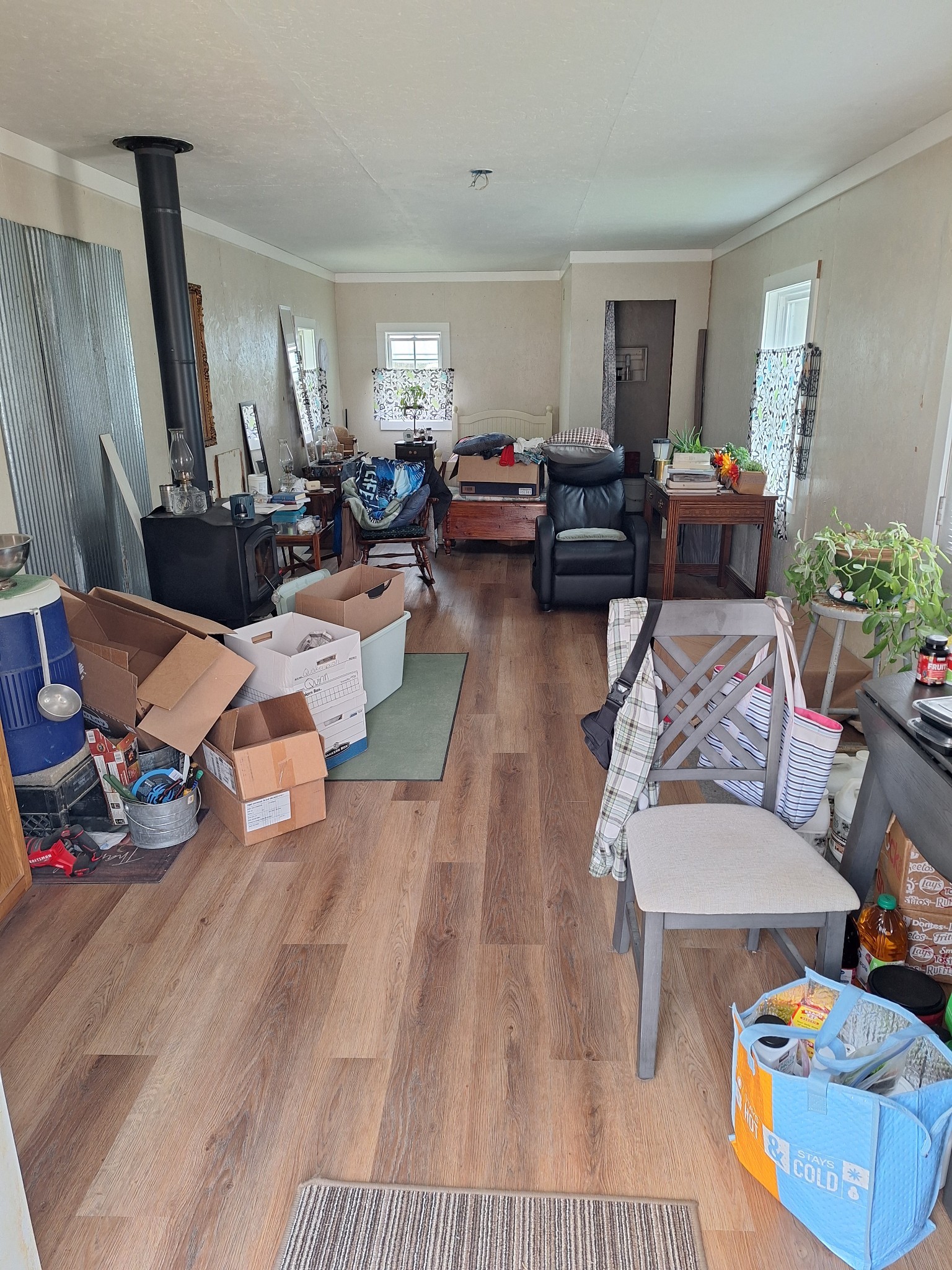 1622 Hill Chapel Road Big Sandy, TN 38221 - Photo 8 of 14 a living room with furniture and a wooden floor