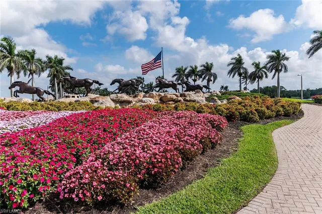 an aerial view of a house with swimming pool and outdoor space