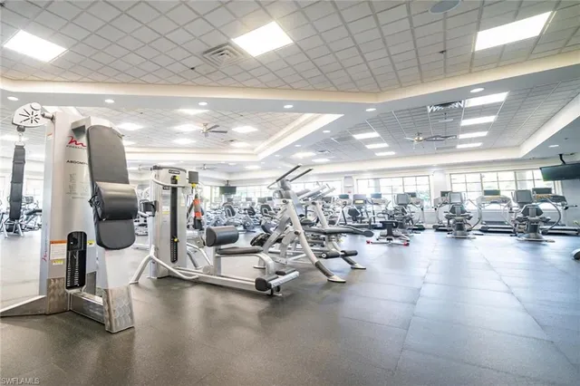 a view of a swimming pool with chairs