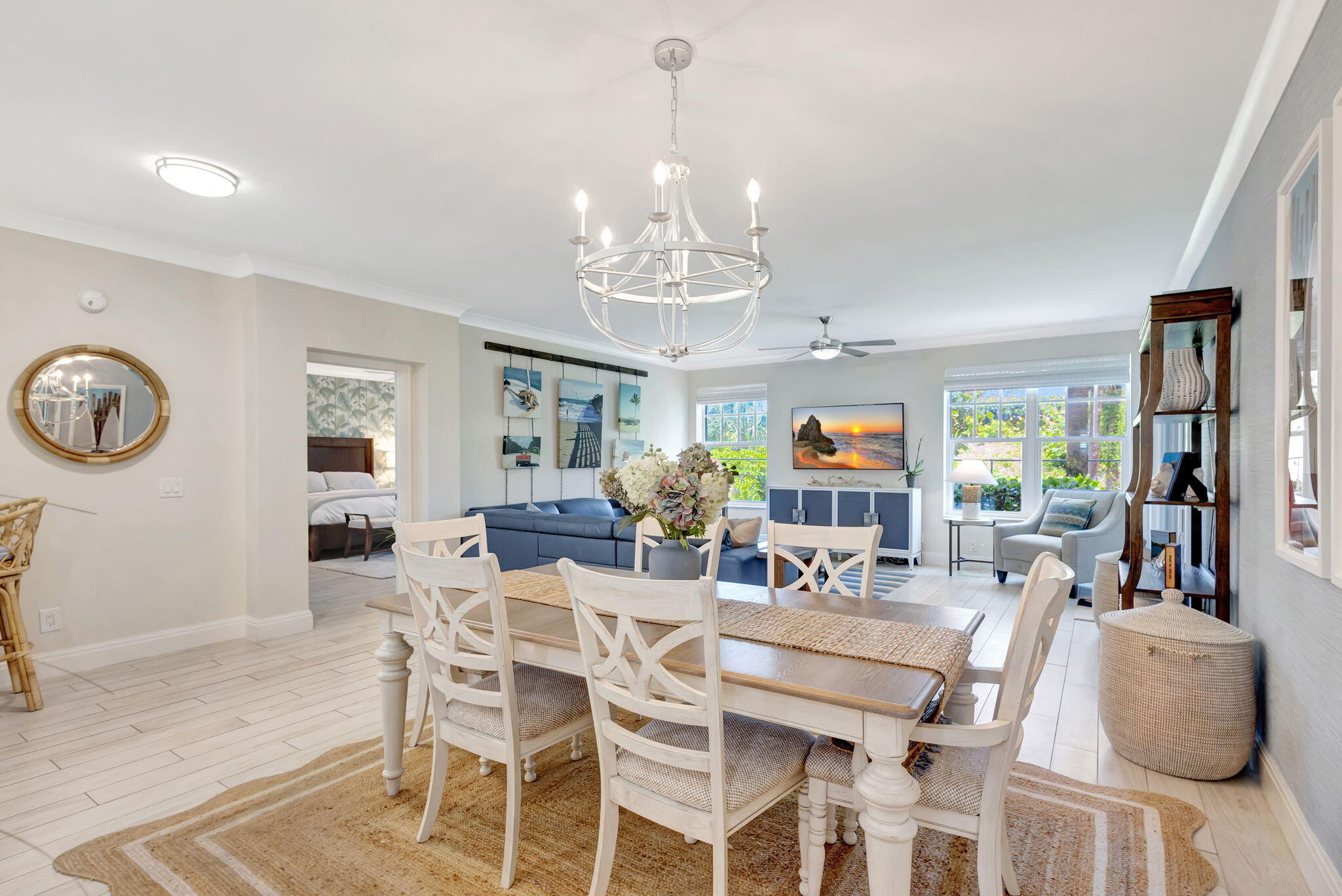 204 Mainsail Circle Jupiter, FL 33477 - Photo 18 of 60 a view of a dining room with furniture and chandelier