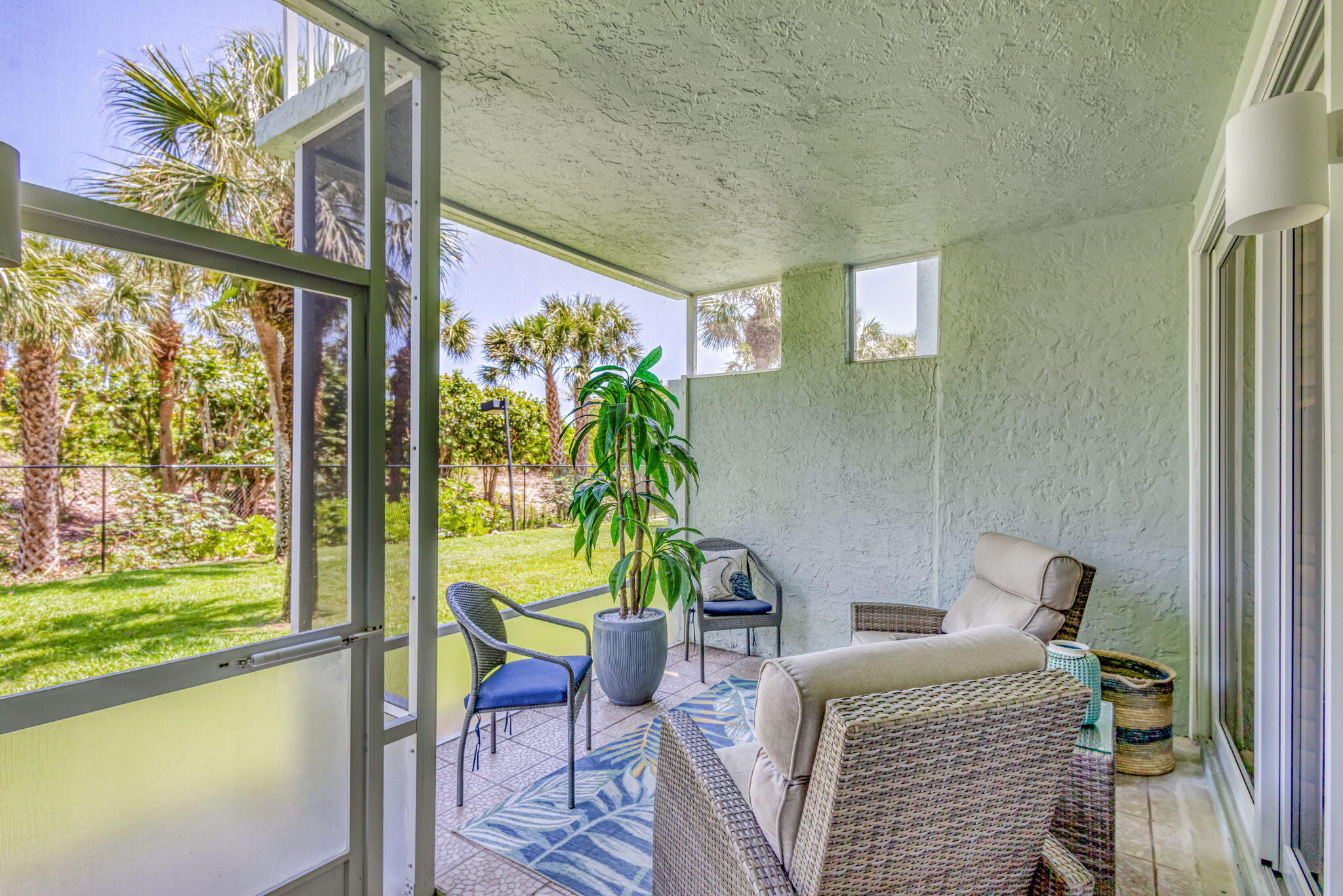 204 Mainsail Circle Jupiter, FL 33477 - Photo 26 of 60 a living room with fireplace furniture and a potted plant
