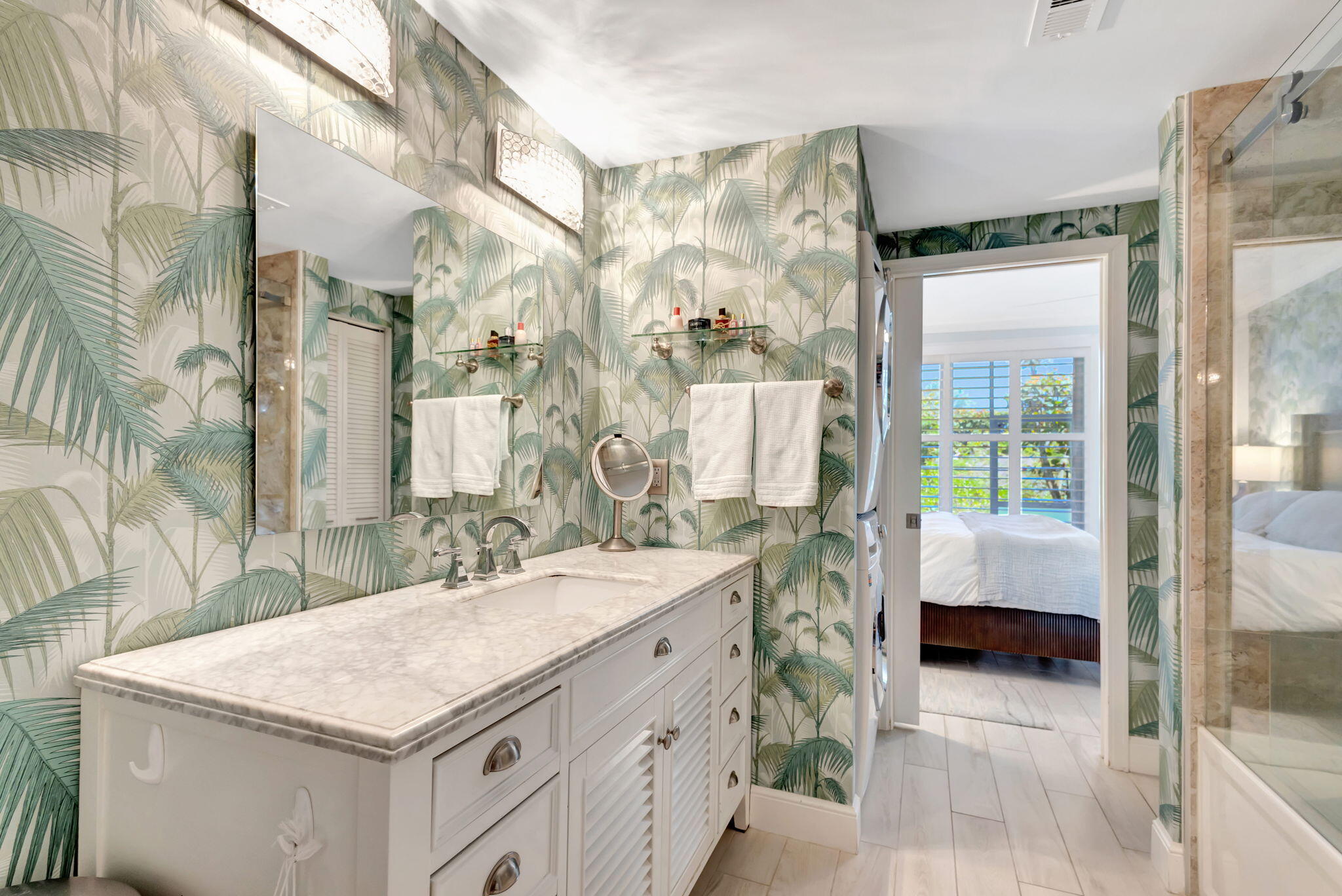 204 Mainsail Circle Jupiter, FL 33477 - Photo 33 of 60 a bathroom with a sink and a mirror